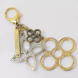 Louis Vuitton key ring.